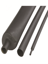 Shrink sleeve with adhesive